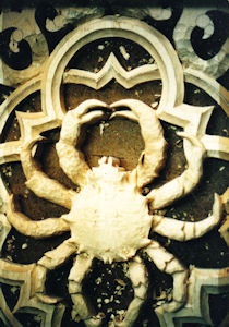 Woodcarving sculpture of crab for pipe shades at All Soul's Episcopal Church in San Diego